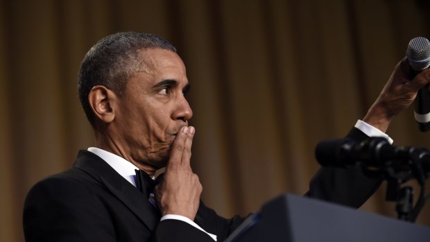 "Obama out": The US President drops the mic to conclude his speech at the annual White House Correspondents' Dinner in Washington on Saturday.