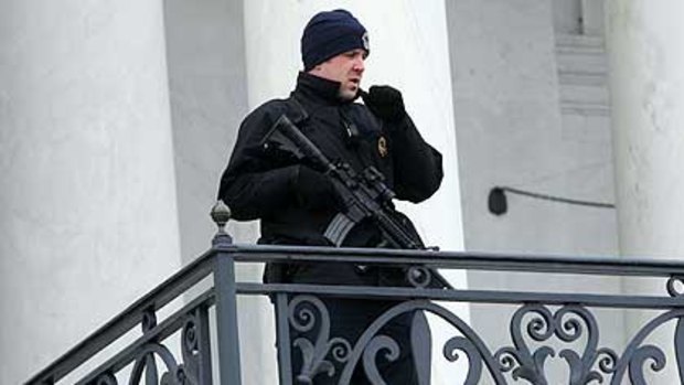 Security personnel keep watch at the US Capitol ahead of the presidential inauguration.