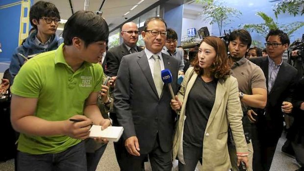 Asiana Airlines president and CEO Yoon Young-doo arrives in San Francisco.