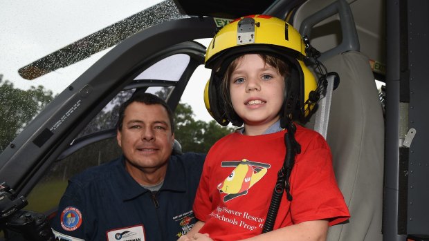 Paul Brennan and Mackenzie Layet during a Westpac Helicopter school visit at Bethania Lutheran School. 