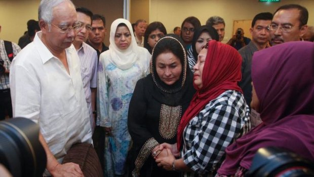 Malaysian Prime Minister Najib Razak and his wife Rosmah Mansor meet family members of MH17 victims on Saturday.