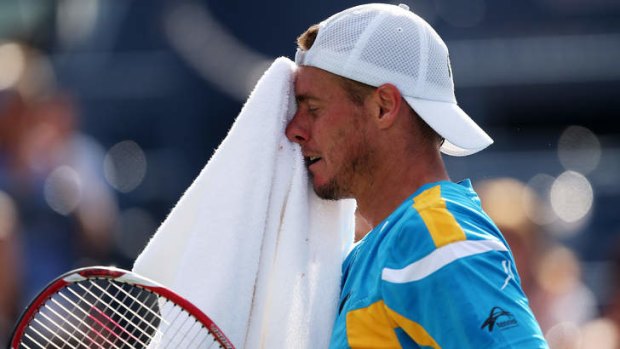 Cooling moment: Lleyton Hewitt takes a breather during his five-set loss at the US Open.