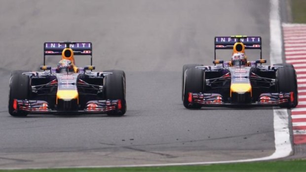 Sebastian Vettel (left) and Daniel Riccardio during the grand prix in Shanghai. 