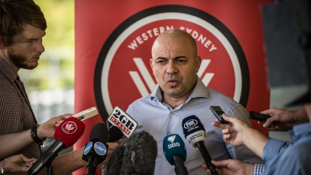 Not happy: Western Sydney Wanderers CEO John Tsatsimas addresses the media in response to the FFA's sanction and $50,000 fine due to the bad behaviour of fans.