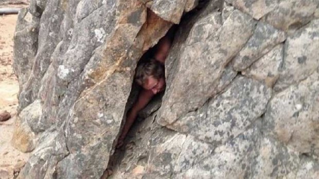 A climber does the "squeeze test" at Mt Arapiles.