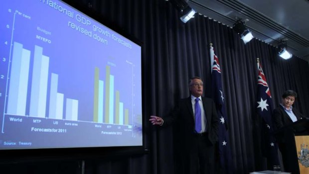 Deputy Prime Minister and Treasurer Wayne Swan and Finance minister Senator Penny Wong deliver the mid-year economic and fiscal outlook.