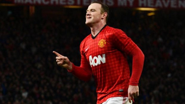 Leading by example: Wayne Rooney will lead Manchester United this season.