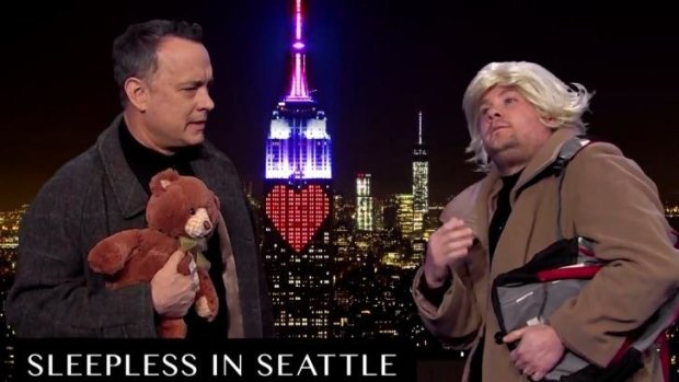 Tom Hanks and James Corden act out a scene from <i>Sleepless in Seattle</i>.