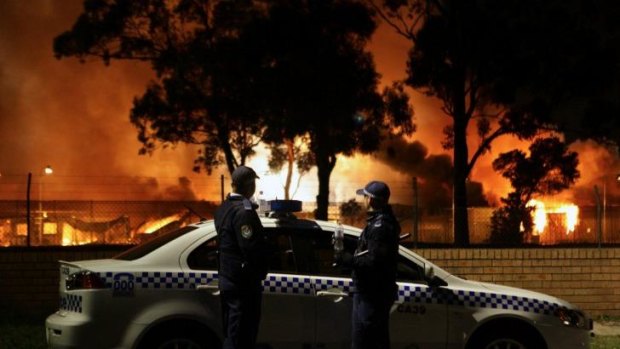 Police attend a riot at the Villawood detention centre in 2011.