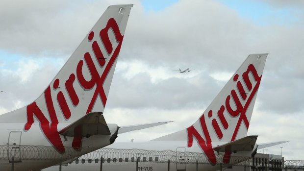 Virgin recorded a pre-tax profit in the second quarter, which includes the busy Christmas holiday travel period.