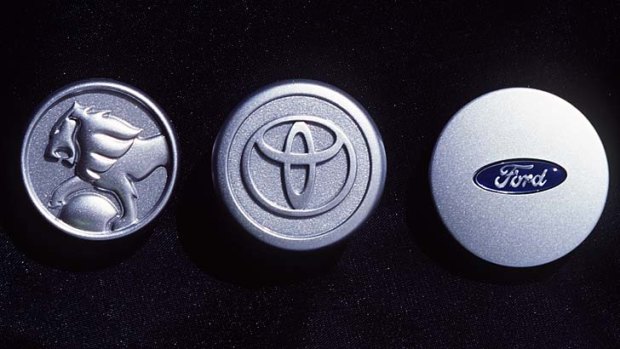Badges of the final three car makers set to quit car manufacturing in Australia.