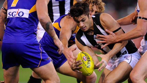 Sharrod Wellingham looks to break free during Collingwood's finals victory over West Coast.