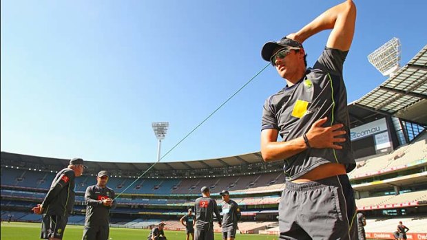 Core strength &#8230; Mitchell Starc limbers up in training at the MCG on Thursday. Australia play Sri Lanka there on Friday.