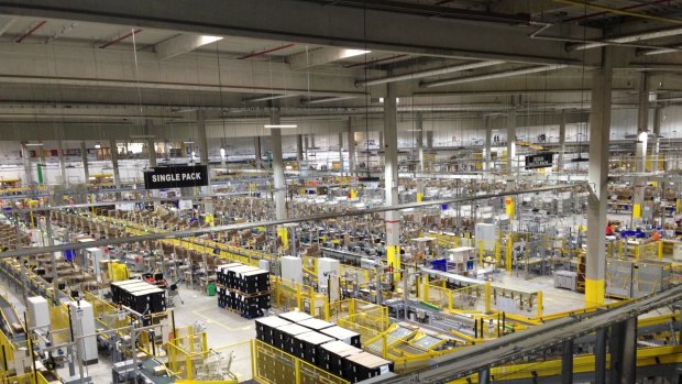 An Amazon warehouse in Germany. Local retailers are divided over what effect the internet giant will have when it arrives in Australia.