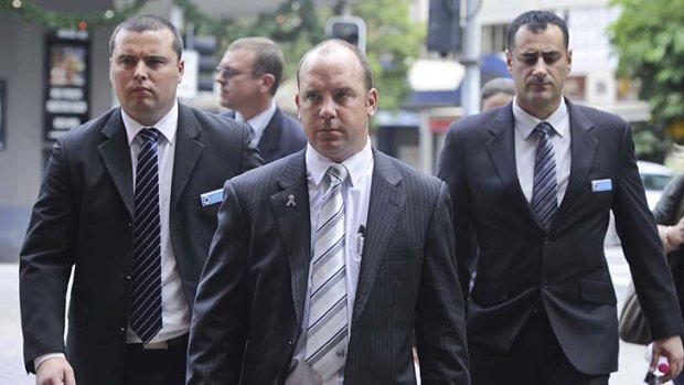 Inquest ... Michael Wilkins, far left, Tony Bear, a police union official, and Paul Rosano, far right.