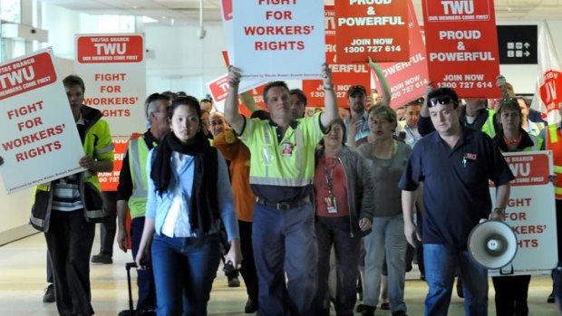 Qantas engineers and ground staff during a two-hour work ban at Melbourne Airport yesterday.