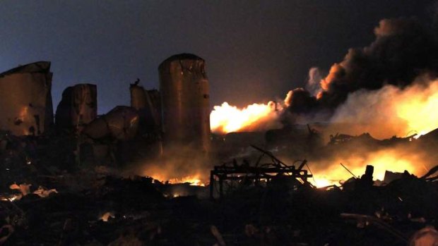 Unexplained disaster: the remains of the fertiliser plant in West on fire after last month's explosion.