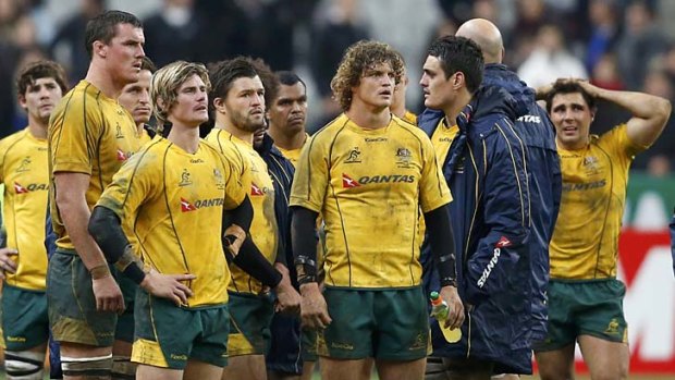 Low point ... the Wallabies after their loss to France.