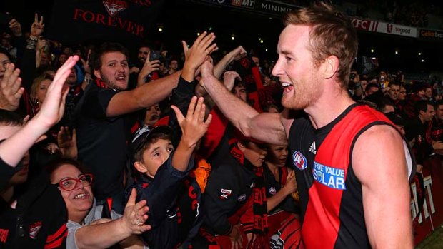 While most of the crowd was pro-Eagle, there was a small contingent of Bombers fans ready to celebrate with Jason Winderlich after Essendon won.