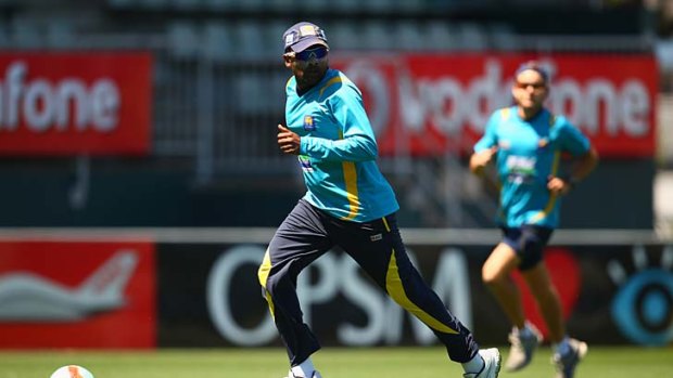 Mahela Jayawardene kicks a soccer ball during a nets session at Blundstone Arena in Hobart on Wednesday.