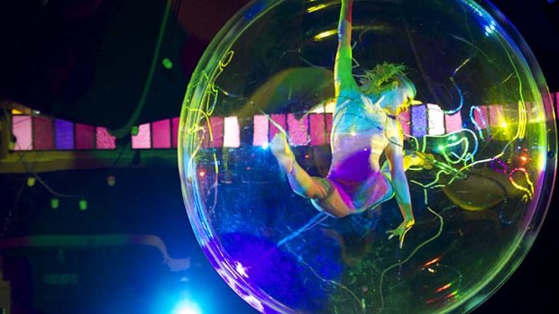 Attention-grabbing &#8230; the performer Elena Lev feeds off her audience's breathless response in her body-contortion hula hoop act in a glass bubble suspended above the stage.