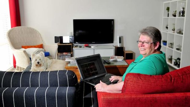 BITING THE BULLET: Annie Wyer, of Macgregor, who had the NBN installed in her home last year, says she hasn't looked back.