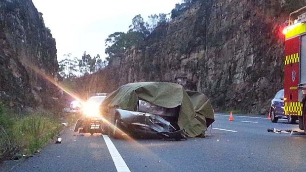 NSW Police posted this image of an early morning crash on the Pacific Motorway which killed two men on Boxing Day.