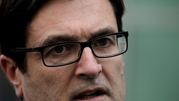 Climate Change Minister Greg Combet says the ads are 'completely misrepresentative'.