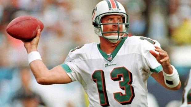 Suing the NFL over concussions ... Miami Dolphins' quarterback Dan Marino looks for a receiver during a playoff game against the Buffalo Bills in Miami on January 2, 1999.