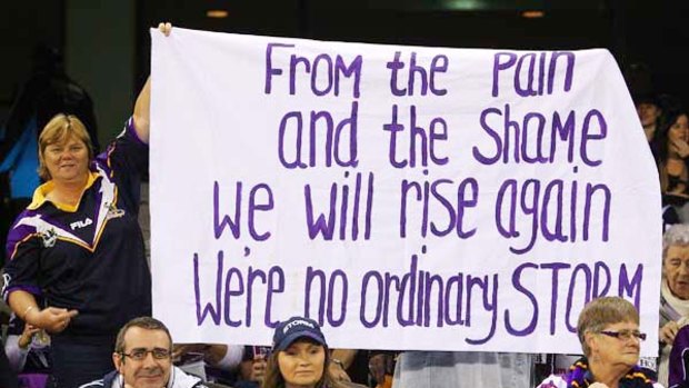 A Storm fan shows her support for her heroes at Etihad Stadium.