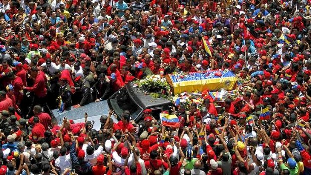 The coffin of Venezuela's late president Hugo Chavez is driven through the streets of Caracas.