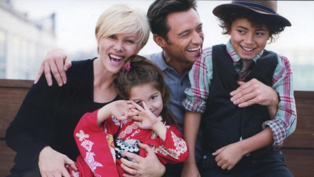 Deborra-lee Furness, pictured with husband Hugh Jackman and children Oscar and Ava, is the founder of Adopt Change.