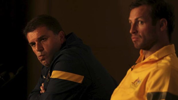 Game face: Ange Postecoglou and Lucas Neill plan their Costa Rica attack for Tuesday night.