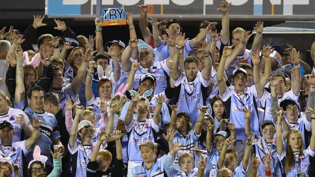 Packed house ... Sharks fans cheer during the match between Cronulla and St George Illawara