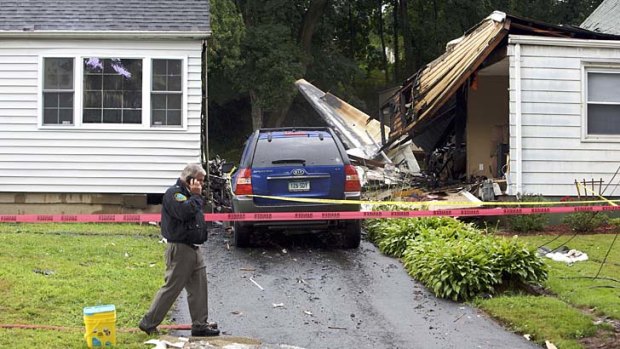 There are fears two children have died after a plane crashed into their home in East Haven, Connecticut.