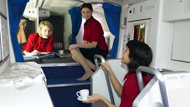 The crew rest area on board a Boeing 777. Ultra-long haul aircraft's journey times require a reserve crew.