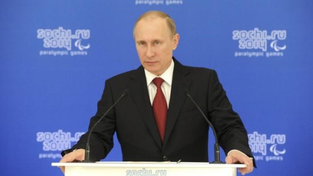Russian President Vladimir Putin is juggling Ukraine crises talks with duties at the Sochi Paralympics.
