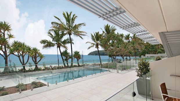 A view of the swimming pool and beyond from Fairshore Beachfront Apartments at Noosa.