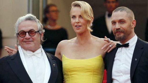 George Miller, Charlize Theron and Tom Hardy on the red carpet at Cannes for the screening of <i>Mad Max: Fury Road</i>.