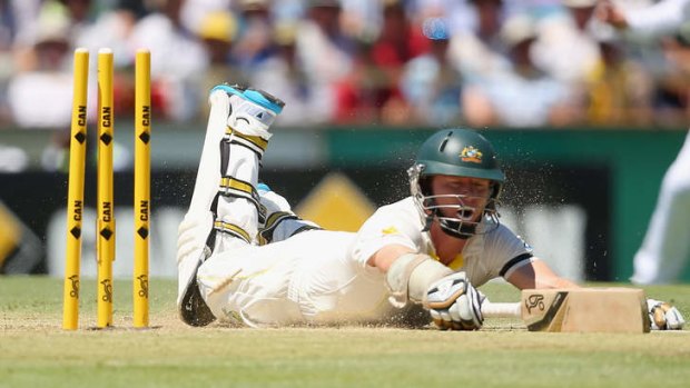 Caught short: Chris Rogers is run out in the second over of Australia's innings.