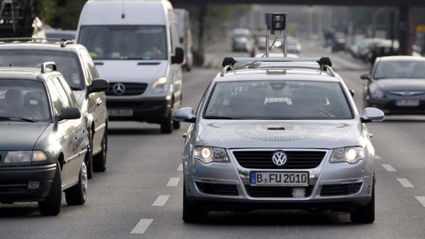 A car of the Autonomos Labs drives controlled by a computer through Berlin, Germany.