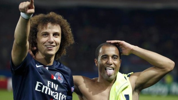 Paris St Germain's David Luiz (left) and Lucas acknowledge the crowd after their stunning victory.