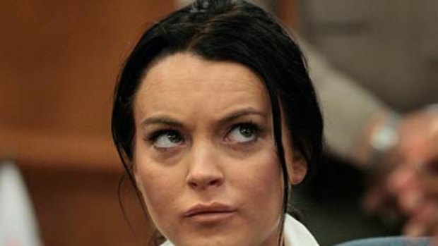 Ordered to wear an alcohol monitoring bracelet ... Lindsay Lohan in court.