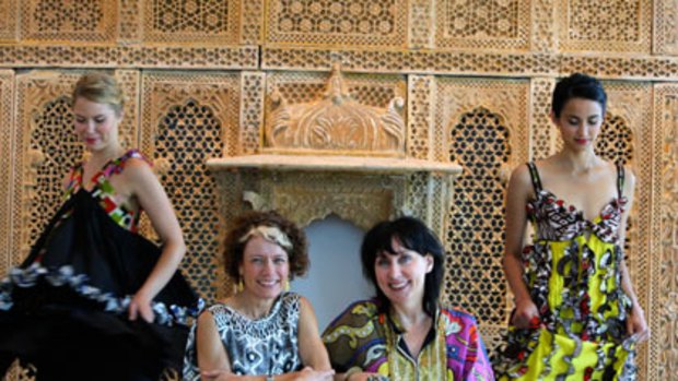 Laureate winners are grinners ...  Lydia Pearson, left,  and Pamela Easton with models wearing  their designs at the Art Gallery of NSW.