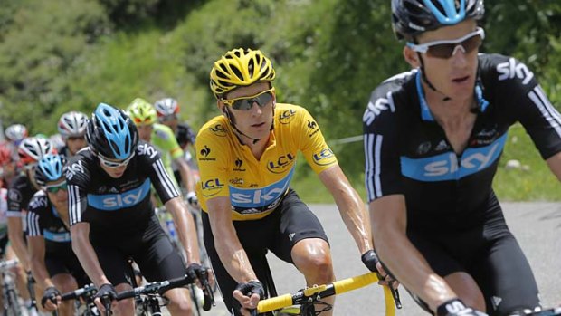 Copping abuse &#8230; Australian Michael Rogers leads the way for Briton Bradley Wiggins in the overall leader's yellow jersey.