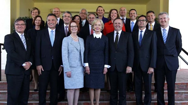All smiles: Julia Gillard with her new-look ministry.