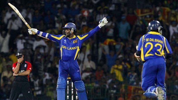 Two up ... Sri Lanka's Upul Tharanga celebrates their victory with teammate Tillakaratne Dilshan.