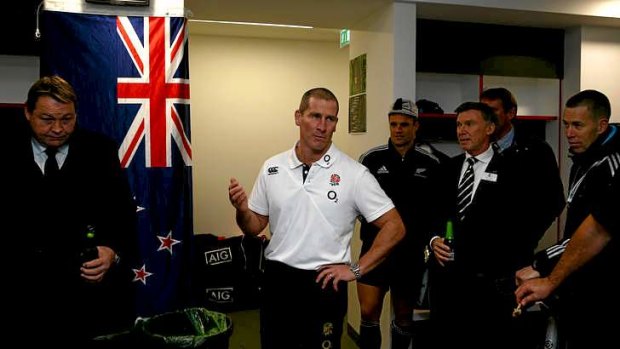 Speaking with the enemy: England head coach Stuart Lancaster addresses the All Blacks after his side's loss to the Kiwis.
