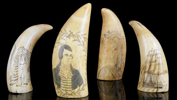 A selection of scrimshaw from the sale.