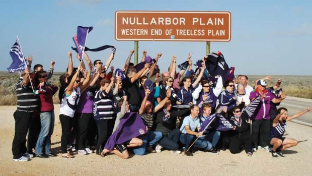 Photo opportunity: Freo fans show their colours at Balladonia.